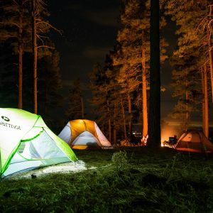 Basecamp 6 family camping tent set up in a mountain meadow